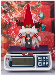 Detailed close-up of a 63g handmade Christmas Rudolph gnome plush with reindeer antlers