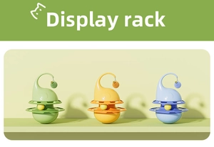Three-color tumbler cat toys with plush balls on a yellow display stand
