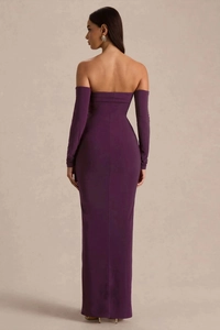 Detail view of the back of a deep purple off-shoulder dress with elegant long sleeves