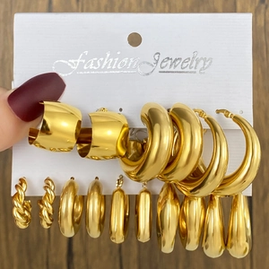 9-piece gold stainless steel hoop earring set with twisted rings and drop pendants
