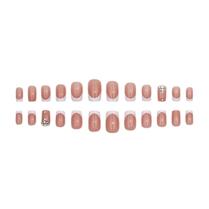 Classic French nude pink press-on nails set with sparkling rhinestones and white tips
