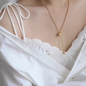 Minimalist 18K gold-plated Y-necklace with sphere pendants on a snake chain