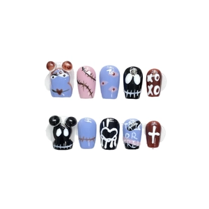 Handmade Halloween press-on nails featuring cute 3D cartoon monsters and trick or treat art