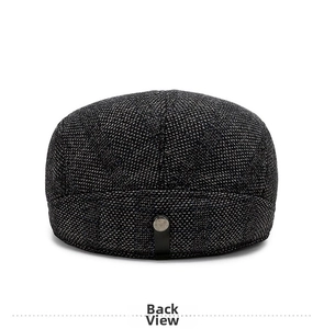 Detail of grey plaid beret with leather strap and metal buckle, back view