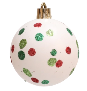 Detail of white Christmas ball with red and green glitter polka dots for tree decoration