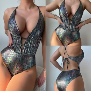 Detail of laser shiny metallic monokini featuring drawstring backless design and snake texture