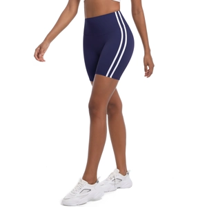 Close-up of high-waist fitness shorts featuring white stripes on deep blue fabric