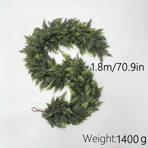 Detail of 1.8m lifelike Norfolk pine garland showing flexible green rubber texture