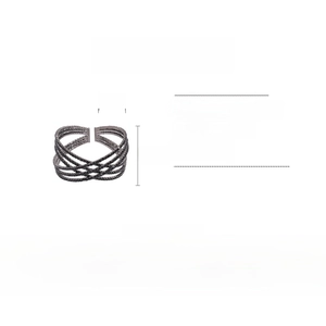 Detail view of a triple-layer geometric crossover bangle with black crystals and iron