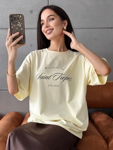 Women's loose-fit cotton t-shirt in pale yellow with Saint Tropez artistic lettering