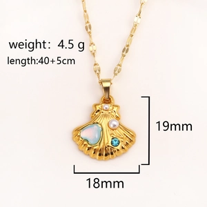 Gold plated ocean shell pendant necklace with pearl and blue gemstone accents