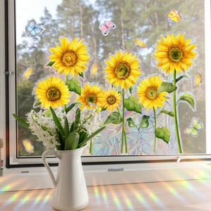 Rainbow suncatcher butterfly sunflower window stickers creating colorful prism reflections