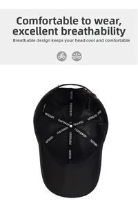 Detail of the breathable mesh interior and branded inner lining of this black baseball cap