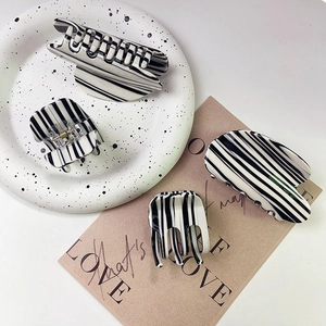 Striped black and white hair claw clip set for women in elegant zebra pattern finish