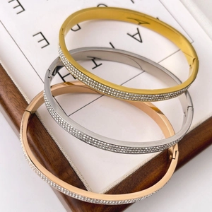 Luxe titanium steel open bangles with rows of zircons in gold, silver, and rose gold