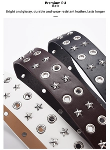 Detail of punk style PU leather belts with metal star studs and double row eyelets