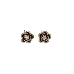Boucles d'oreilles fleurs noires et dorées avec perles et cristaux, design symétrique