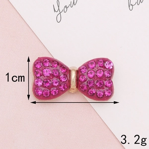 Sparkly rose pink rhinestone bow accessory for DIY crafts with 1cm size and 3.2g weight