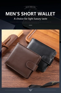 Macro shot of men's vintage PU leather bifold wallets in black and deep brown colors