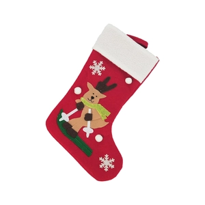 Christmas stocking decoration with reindeer pattern and white faux fur trim for fireplace