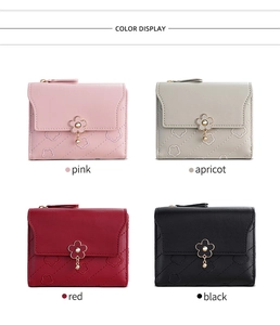 Short faux leather bifold wallets in pink, apricot, red, and black color options