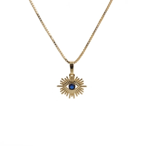 Gold box chain necklace with evil eye sun pendant and blue center stone on white backdrop