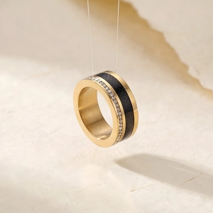 Golden titanium steel ring with black galaxy inlay and micro-pave diamond row