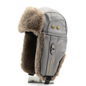 Winter faux leather trapper hat with thick plush earflaps and metal rivets in silver