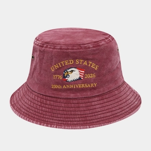 Close-up of high-quality embroidery and metal eyelets on burgundy washed cotton bucket hat