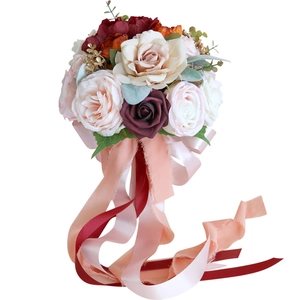 Artificial bridal bouquet with pink, champagne roses and long silk ribbons for weddings
