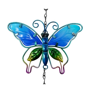 Detail of blue glass butterfly wind chime with iridescent metallic frame on white backdrop