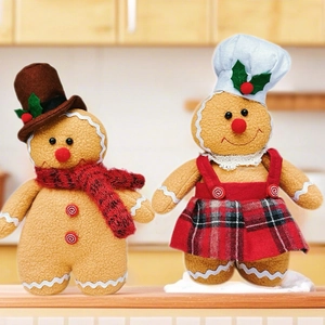Pair of plush gingerbread man Christmas gnomes in wool and felt for holiday decoration