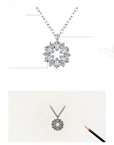Detailed view of sterling silver snowflake pendant with 5A grade zircon stone inlays