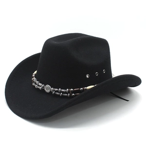 Black western cowboy hat with ethnic beaded band and metallic eyelets on white backdrop