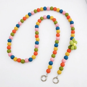 Colorful matte beaded crossbody phone strap with green flower charm and silver rings