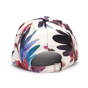 Detail of floral baseball cap back with silver metal buckle and adjustable strap