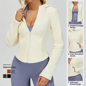 Slim fit women's hooded fleece jacket in pale yellow with zipper and side pockets