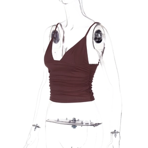 Detail shot of a brown V-neck camisole featuring ruched fabric textures and thin straps