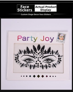 Detailed close-up of symmetrical black face crystal sticker and branded packaging