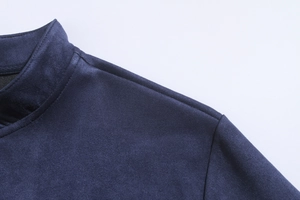 Detail of navy blue suede jacket showing premium stitching and stand-up collar texture