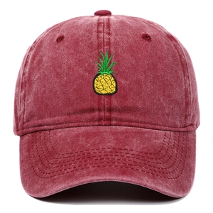 Vintage washed dark red baseball cap featuring yellow pineapple embroidery on front