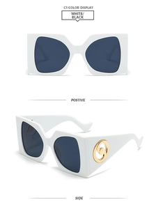 Detailed views of square oversized white sunglasses with gold circular temple accents