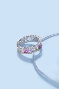 Detailed macro view showing S925 sterling silver stamp and colorful zircon gemstones