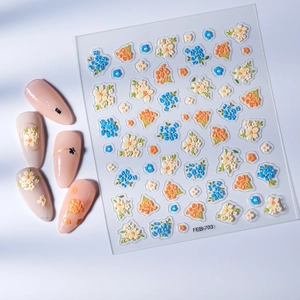 3D embossed floral nail art stickers with elegant blue and orange flower designs