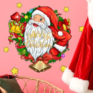 Sticker mural Père Noël festif avec lettrage Merry Christmas sur un mur de salon rose clair