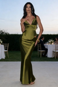 Detail of elegant olive green satin maxi dress showing silky texture and corset design