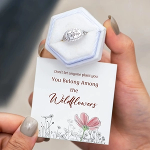 Silver flower ring in a white velvet box with a romantic wildflower greeting card