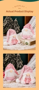 Detail of pink sequin Christmas gnomes with knitted hats for festive holiday decoration