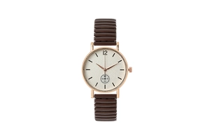 Gros plan détaillé d'une montre à quartz vintage or rose avec cadran crème et bracelet élastique