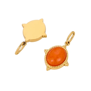 Detailed macro view showing the gold-tone metal base and oval orange gemstone pendant